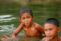 children play in the water